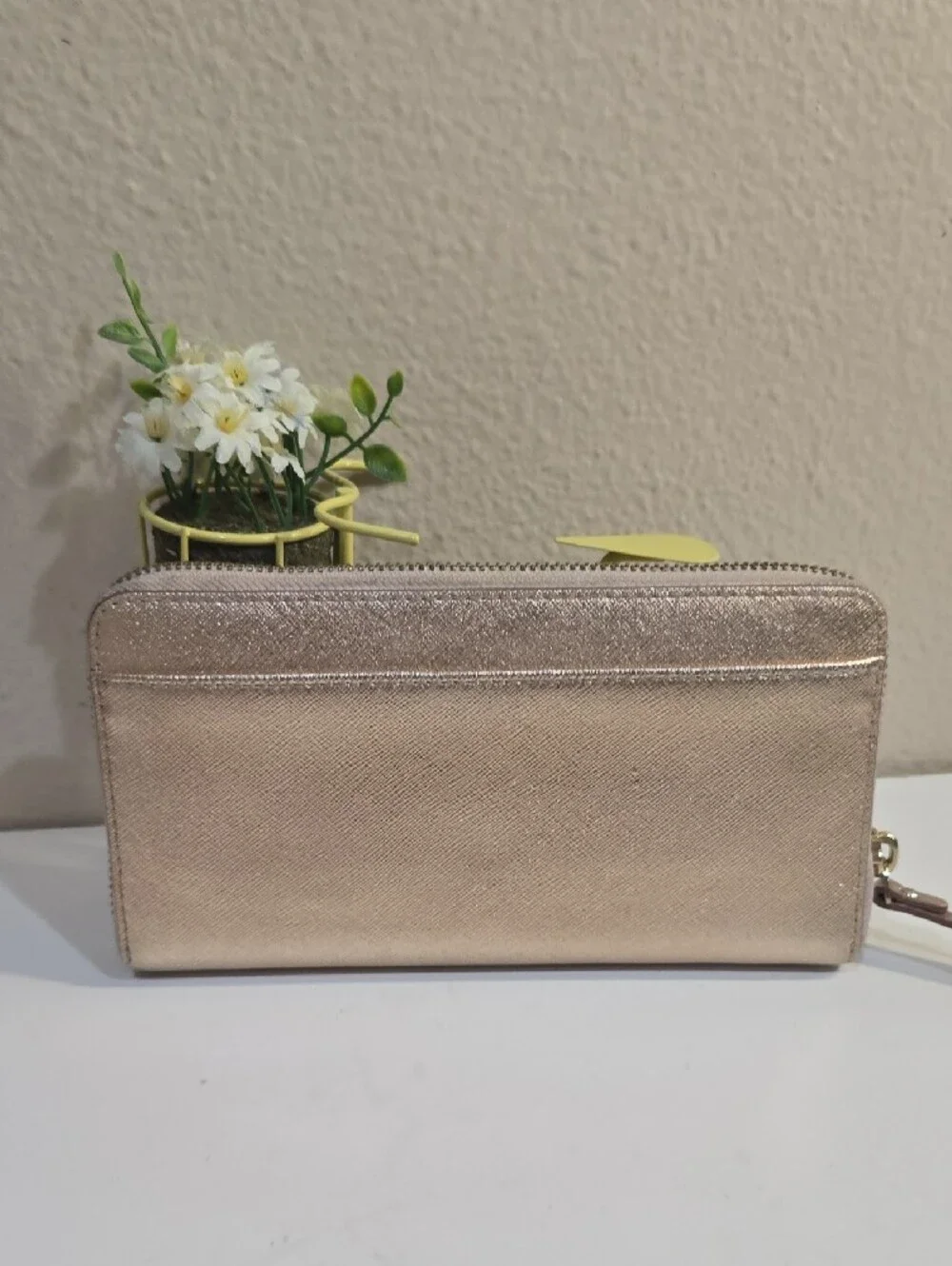 kate spade metallic rose gold zip-around continental wallet